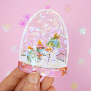 Holographic Snowglobe sticker by Franje Design